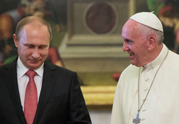 Президент России Владимир Путин и папа римский Франциск во время встречи в Ватикане. Фото: РИА Новости, Сергей Гунеев