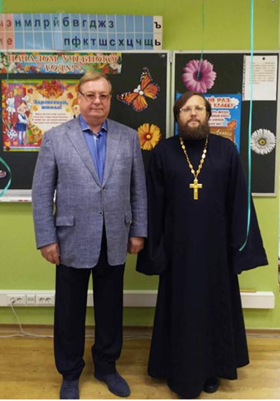 С.В.Степашин со священником Григорием Федотовым