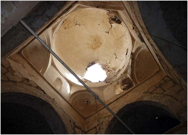 © РИА Новости / Игорь Лоцман. Купол пострадавшей от боевых действий церкви в сирийском городе Маалюля в 55 км от Дамаска